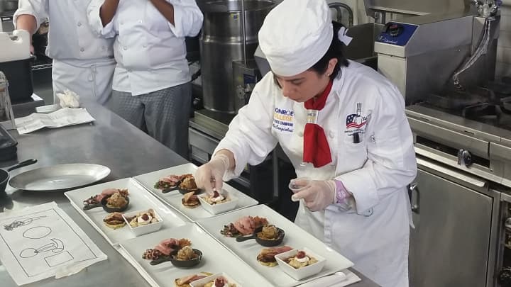 New Rochelle culinary student Rossella Cangialosi practicing in advance of the ACF National Student Chef of the Year competition.