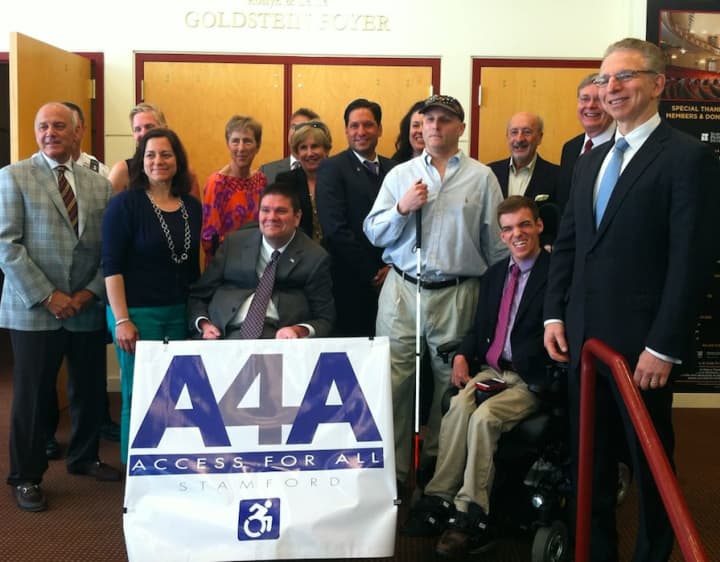 Members of the Committee on Access 4 All (A4A) pose after the unveiling of the committee Wednesday morning at the Palace Theatre.