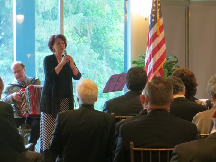 Mary Mancini, accompanied by Mario Tucca, sang &quot;Memories&quot; at Thursday&#x27;s service at Tappan Hill Mansion in Tarrytown for former Westchester County Executive Alfred DelBello, who died on May 15 at the age of 80.