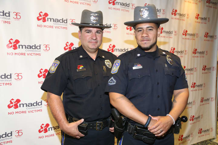 Western Connecticut State University police officers Trevor Burke, left, of Waterbury, and Luis DosSantos, of Wolcott, recently were honored for their efforts to prevent drunken driving in Danbury.