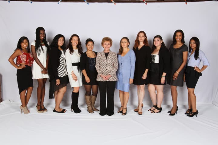 Judge Judy and a group of women from the Her Honor Mentoring Graduation on June 3.