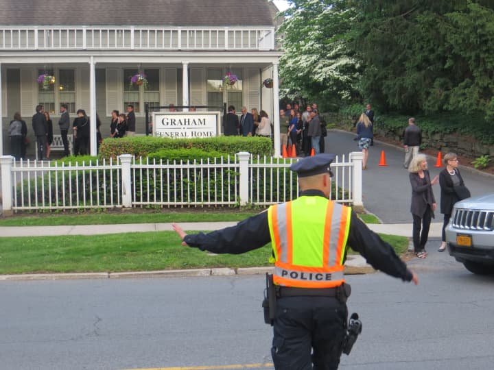 Rye police directing traffic on Friday evening outside the wake for Katherine Chappell, the video effects editor killed on Monday by a South African lion.