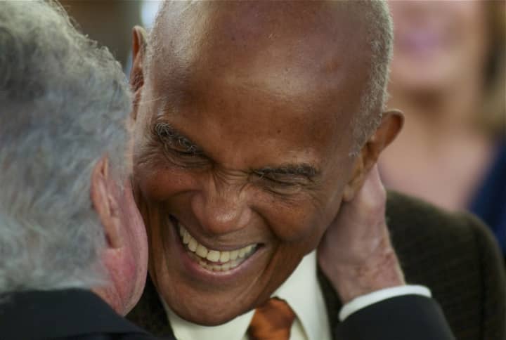 Regis Philbin greets honoree Harry Belafonte at the Changemaker Gala at the Greenwich Film Festival.