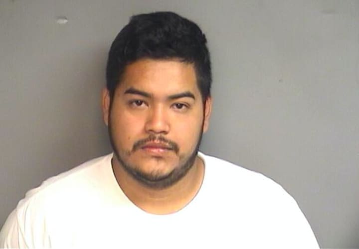 Christian O. Flores-Garcia, 25, of 68 Woodside St., is charged in the violent assault on his girlfriend Friday night Stamford Police said.