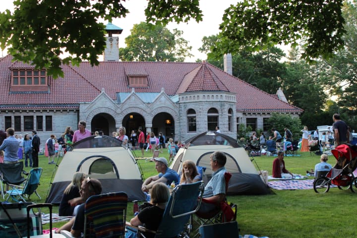 Fairfield residents of all ages enjoy food, live music and friendship on the Great Lawn at Pequot Library during the 2014 annual Potluck, Outdoor Concert and Campout.