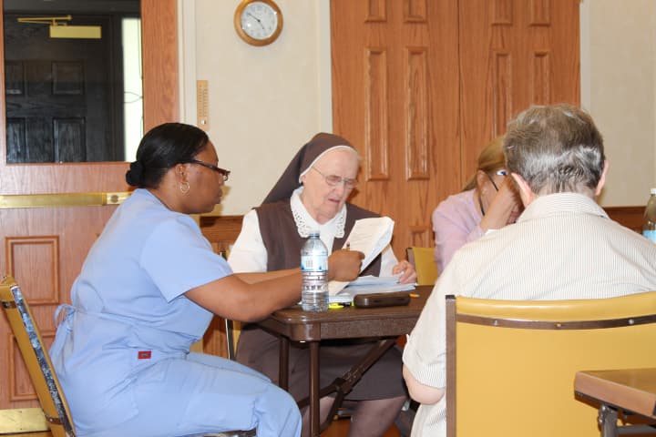Audrey Henry and Sister Jean Beyette during the dementia care training program.