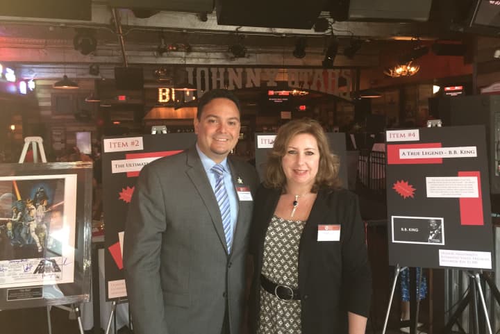 Carlos Reinoso and Kim Killoy of the Human Services Council at Johnny Utah&#x27;s for the start of the seventh annual SoNo Stroll.