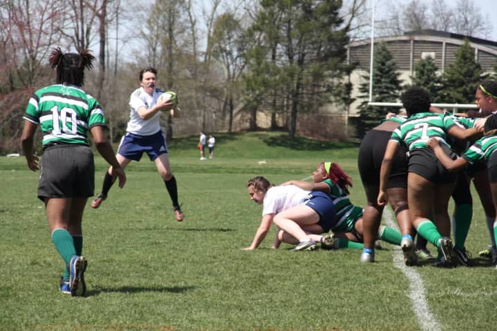 Julia Frisch, named to the NJ/NY Girls Rugby 15s All-Star Team, goes airborne in an attempt to score for Harvey against South Jersey in a game this season.
