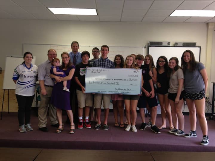The New Rochelle High School Irish Club recently presented a check for $2,500 to the Cystic Fibrosis Foundation.