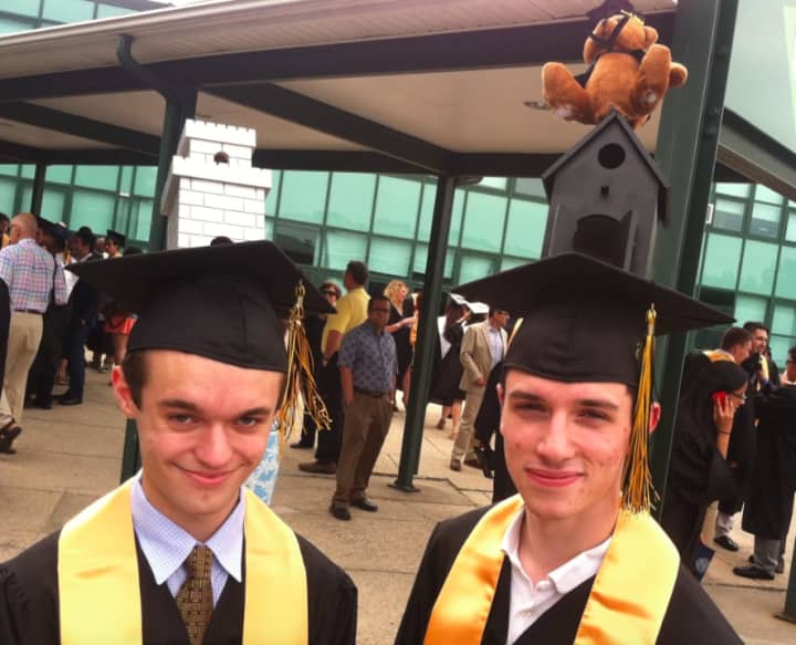 Andrew Baron, left, and Marc Grasso, added some style to their mortarboards.