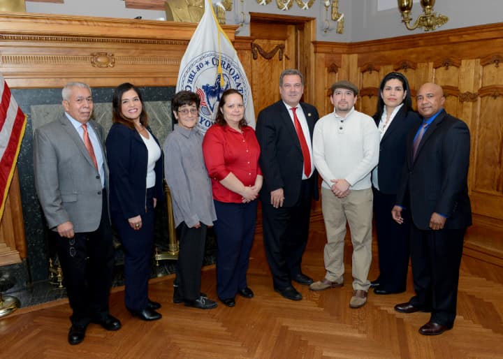 Grace Borrani, pictured second from left, along with other members of the Hispanic Advisory Board and Mayor Mike Spano (fifth from left).