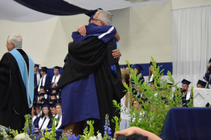 A hug for a happy graduate. 