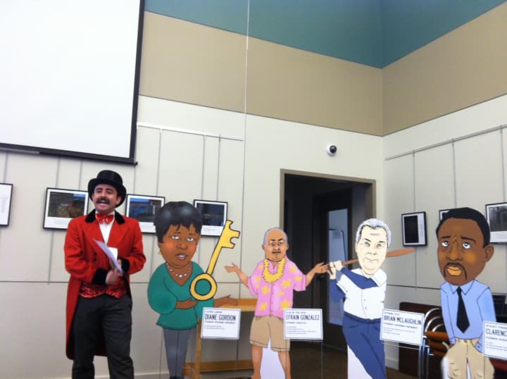 The &quot;Caravan of Corruption&quot; tour in Mount Kisco used cardboard cutouts of former New York officials convicted of corruption. Here, the &quot;ringmaster&quot; introduces the politicians and their crimes.
