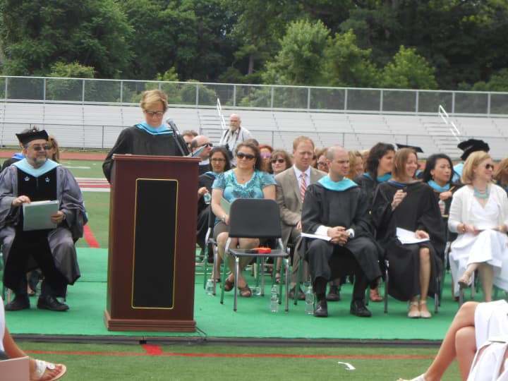 Principal of Rye High School, Patricia Taylor addresses the Class of 2015.  On Friday, Taylor confirmed the tragic death of a Rye High graduate of the Class of 2014..