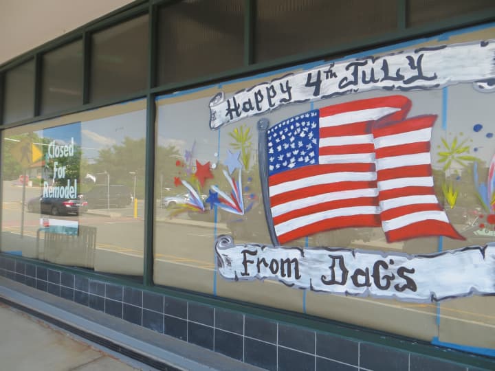 One sign from July 2015 outside D&#x27;Agostino market said, &quot;Closed For Remodel&quot; while another said &quot;Happy 4th July From Dag&#x27;s.&quot;