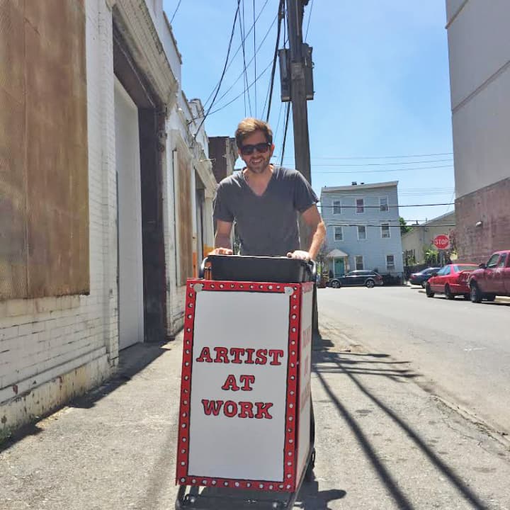 Matt Smith brings his &quot;pushcart art-for-volunteerism project&quot; to the streets of Westchester.