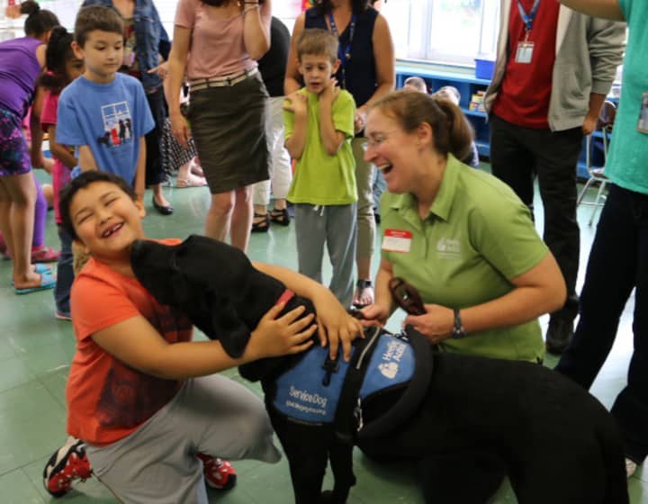 A representative from Guiding Eyes brought one of its autism dogs to discuss autism with the fifth-grade students at Thomas Jefferson Elementary School.