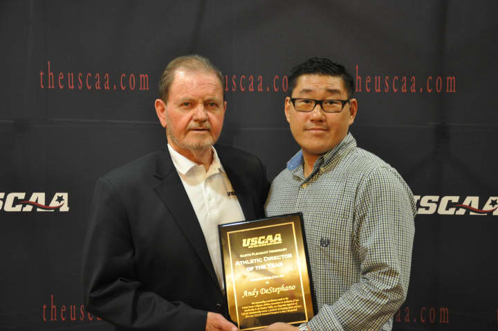 Bill Casto, left, executive director, United States Collegiate Athletic Association, presents Andy DeStephano, Berkeley College Director of Athletics, with the USCAA Athletic Director of the Year award. 