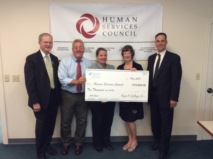 First County Bank&#x27;s David Van Buskirk, AVP and business development officer, and Wendy Macedo, AVP and branch manager presented a check for $10,000 to the Human Services Council in support of the Norwalk Mentor Program.