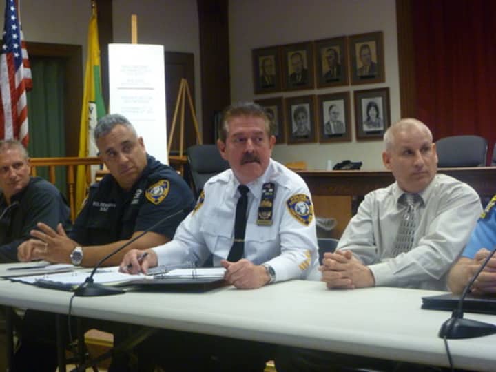 Yorktown Police Chief Daniel McMahon, center, announced a State of Emergency to allow for emergency crews to prepare for Hurricane Sandy.