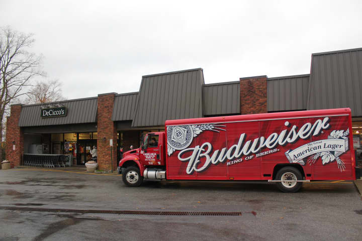 A beer truck arrives with an early morning shipment at DeCicco&#x27;s in Cross River.