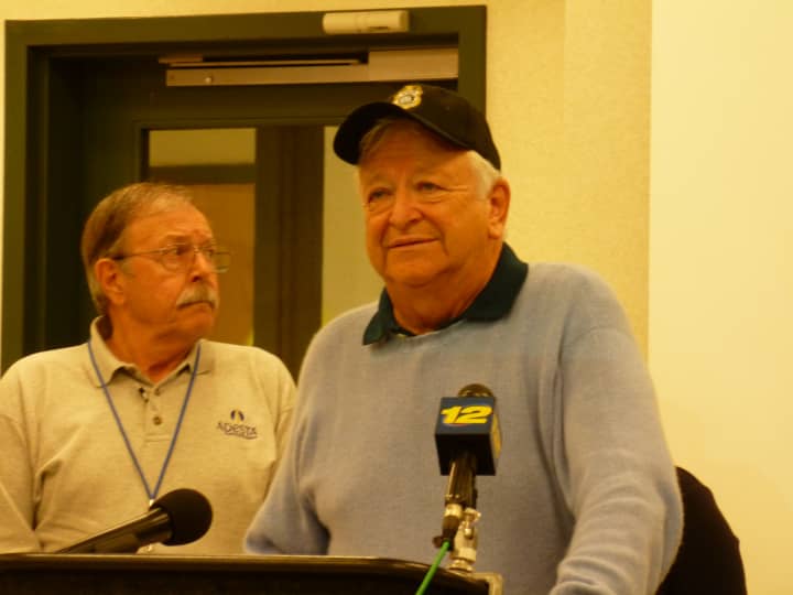 Norwalk Mayor Richard Moccia, with Public Works Director Harold Alvord in the background, speaks at a Hurricane Sandy press conference at Norwalk Police Headquarters Monday.