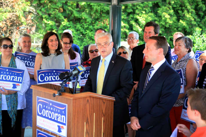 Bedford Councilman Francis Corcoran announces his candidacy for a Westchester County Board of Legislators seat in front of family, friends and Town Board colleagues on Thursday. County Executive Rob Astorino is to the right of the podium.