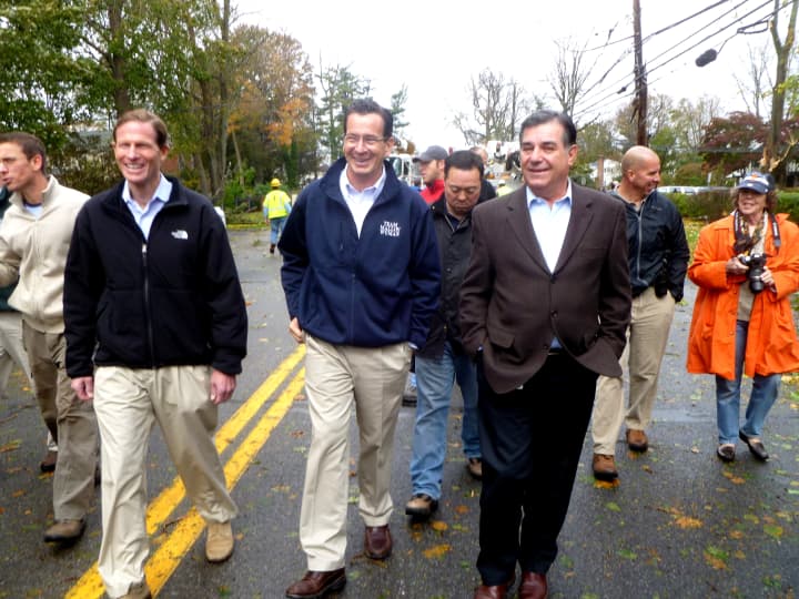 Gov. Dannel Malloy, center, getting an update on Hurricane Sandy&#x27;s damage in Stamford in 2012, is holding  a two-day statewide emergency preparedness drill to simulate a coordinated response to a tornado. 