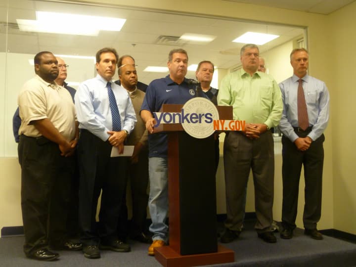 Yonkers officials, seen here in a Monday briefing inside the Office of Emergency Management, are asking residents not to trick-or-treat Wednesday because of damage left by Tropical Storm Sandy.