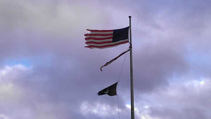 A flag at Yorktown Town Hall was torn to shreds.