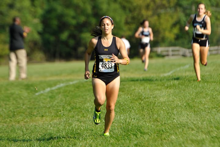 Kara Bucaro of Weston ran a personal best for Towson University in last week&#x27;s Colonial Athletic Association cross country championships.