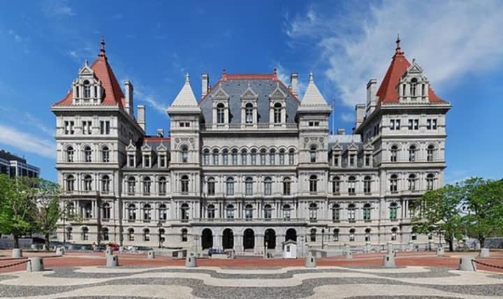 The New York State Capitol building in Albany, where lawmakers made New York the first state to pass legislation allowing women who become pregnant to qualify for health insurance coverage under the Affordable Care Act.