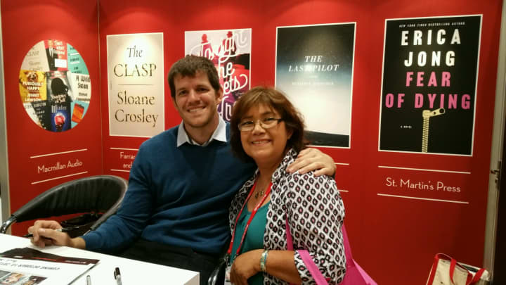 Amada Abad, owner of Galapagos Books, with Brandon Stanton, author of Humans of New York.