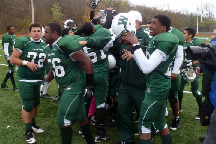 The Woodlands High School football team celebrates its first section championship since 1993.