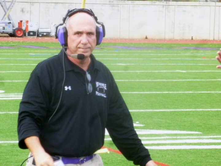 New Rochelle football coach Lou DiRienzo led his Huguenots to another Section 1 Class AA title.