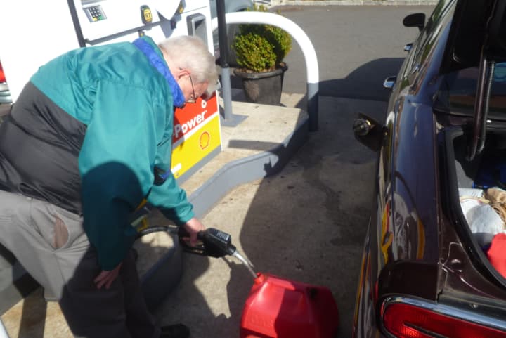 Craig Frey of Long Island filled up his car and two gas cans in Harrison on Monday.