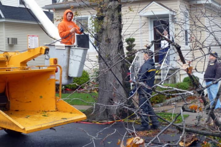 Crews work to restore downed power lines in Yonkers last week. 