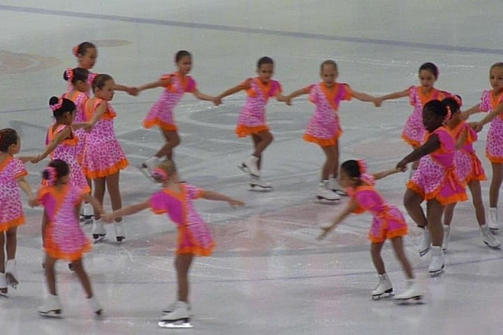 The Skyliners Beginner line skates at a season-opening pep rally at Terry Conners Rink in Stamford.