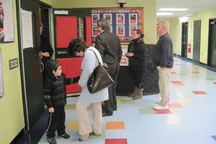 Greenwich voters line up in Byram to cast their ballots.