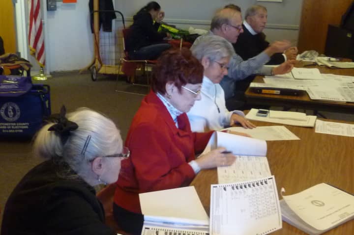 Hundreds of voters turn out at the  Harrison Public Library on Tuesday.