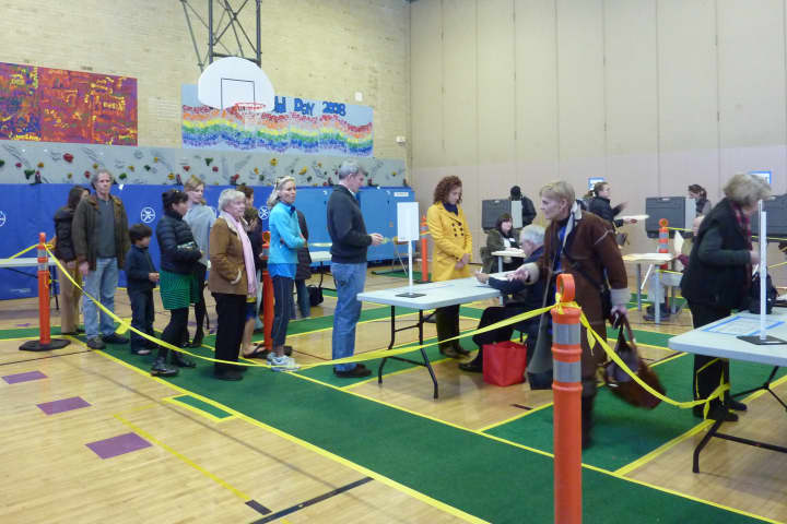 Westport voters line up at Saugatuck Elementary School on Tuesday afternoon to vote.