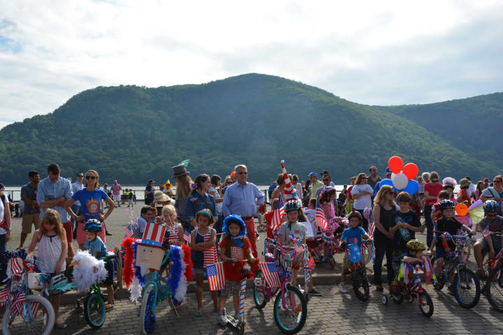 Cold Spring Independence Day parade participants gather along the waterfront following their march. Competition results were announced for kids&#x27; bikes and for dogs.
