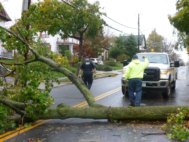 Con Edison crews continued to clear debris after Hurricane Sandy in White Plains.
