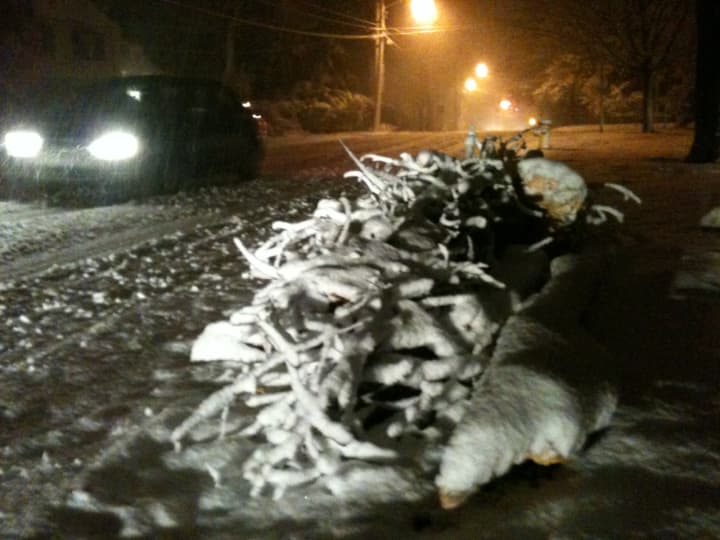 Snow accumulates Wednesday evening on Ridgeway Avenue in White Plains.