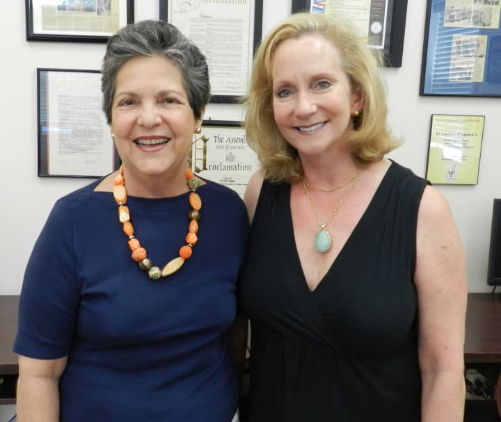 From left, Isabel E. Villar, founder and Executive Director of El Centro Hispano and joins Womans Club of White Plains Event Chair Maryann Martin to announce the date of the organization&#x27;s annual Corks and Forks fundraiser.
