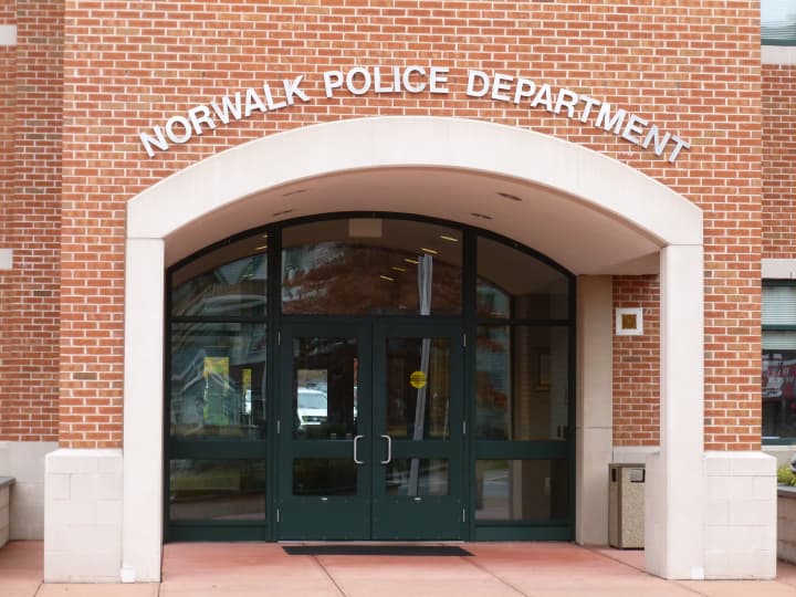 A Norwalk man was arrested Wednesday for allegedly assaulting an officer and heroin possession.