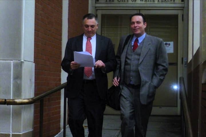 Randall Cutler (right), an attorney who represented former White Plains Mayor Adam Bradley (left), was arrested on felony weapons charges. Police say they found an arsenal of illegal weapons in Cutler&#x27;s house.