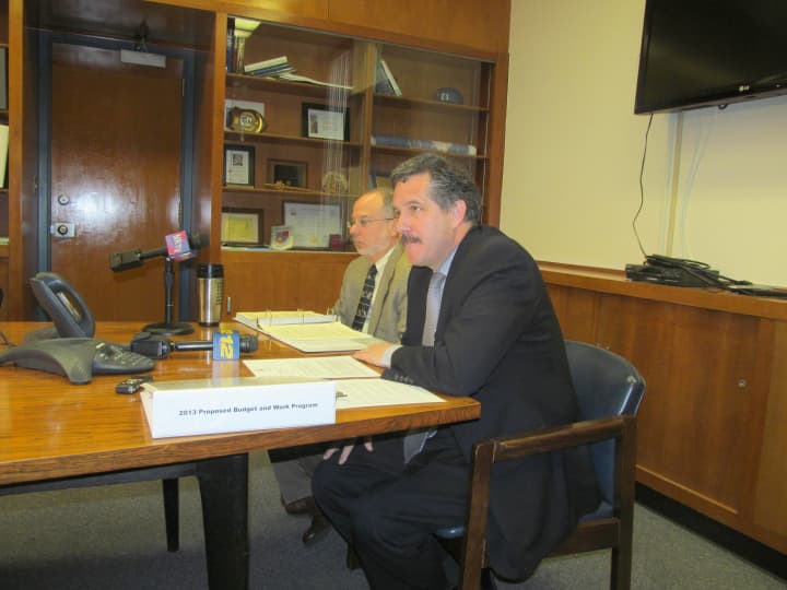 New Rochelle City Manager Charles Strome (right) and city finance Commissioner Howard Rattner release the proposed 2013 city budget Friday.