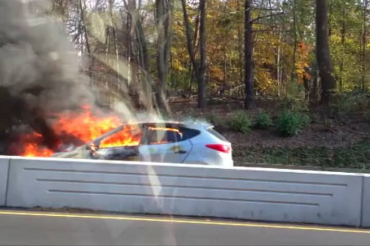 A two car accident caused a car fire on the Merritt Parkway in Fairfield Saturday.