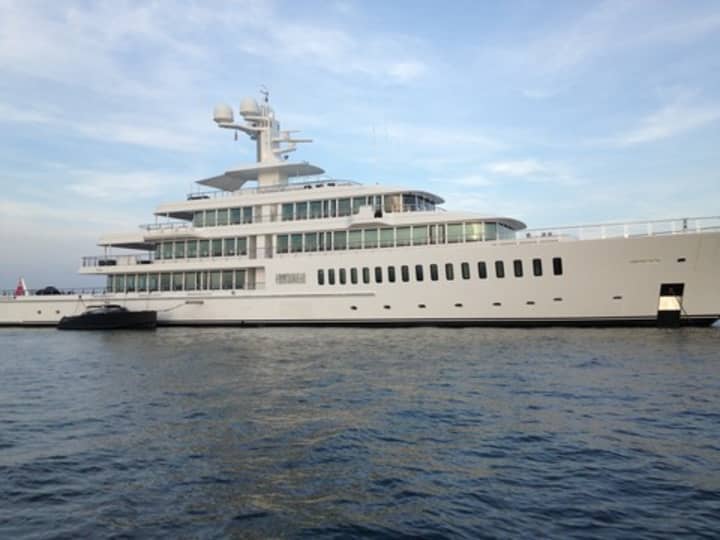 Mark Cuban&#x27;s yacht, anchored off Stamford Harbor, has three smaller boats onboard to ferry guests and crew to and from the shore. 